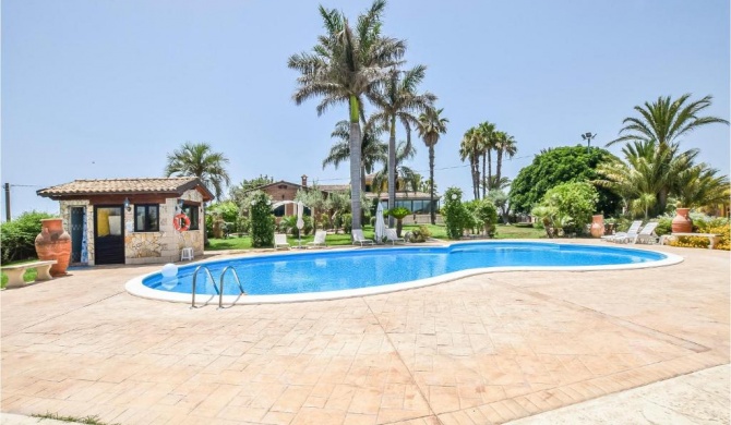 Nice home in Ispica with Outdoor swimming pool, WiFi and 3 Bedrooms